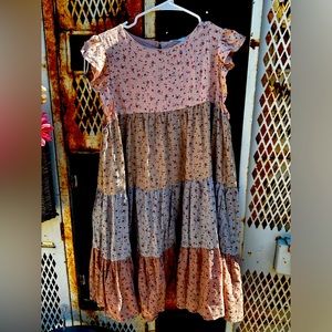 Cute tiered floral dress with tags.